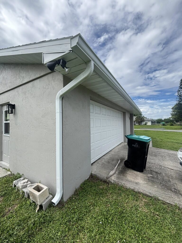 Freshly installed seamless gutter system on a residential home exterior with a clean finish, completed by Gutter Cleaning Rochester.