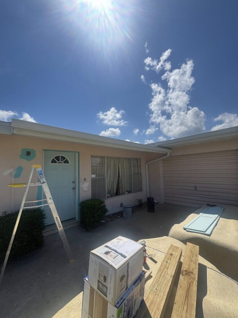 Professional-grade gutter cleaning equipment including extension ladders, specialized scoops, and high-power leaf blowers used for safe and efficient debris removal.